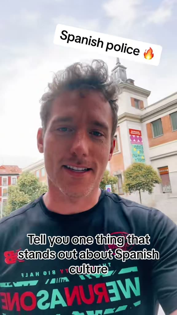 Christopher Adams on a street in Spain; the title card reads Spanish police